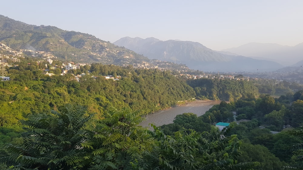 a view of a valley with a river running through it