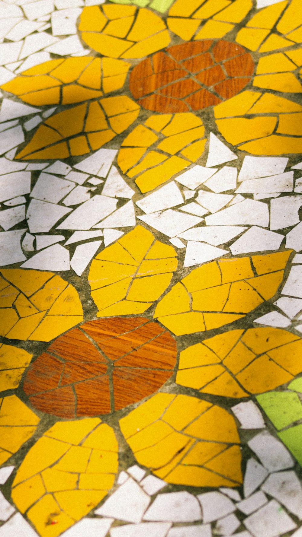 a close up of a flower design on a table