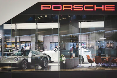 Elegant showroom display featuring Bentley, Maserati, and Rolls Royce parts.