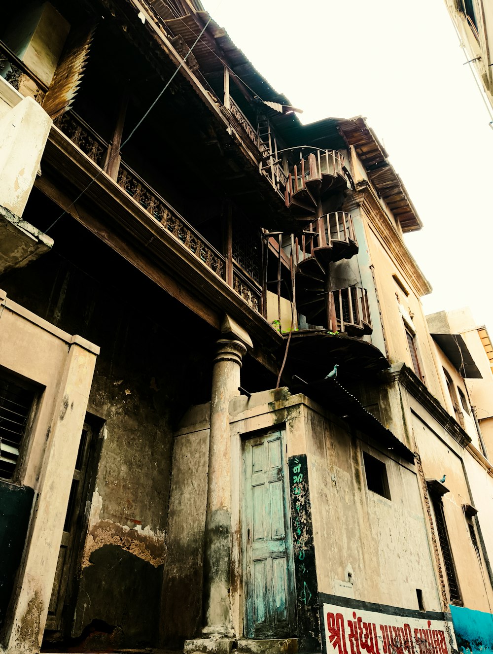 an old building with a spiral stair case