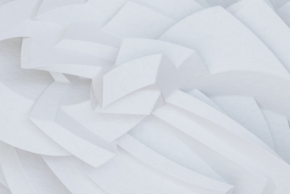 a close up of a white sculpture made of paper