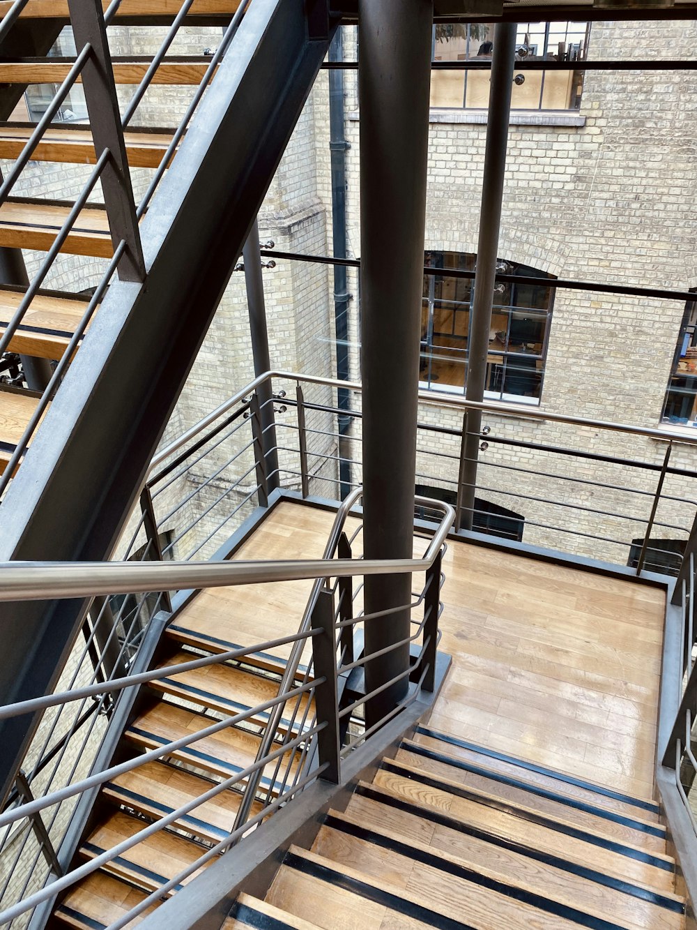 a view of a metal stair case in a building