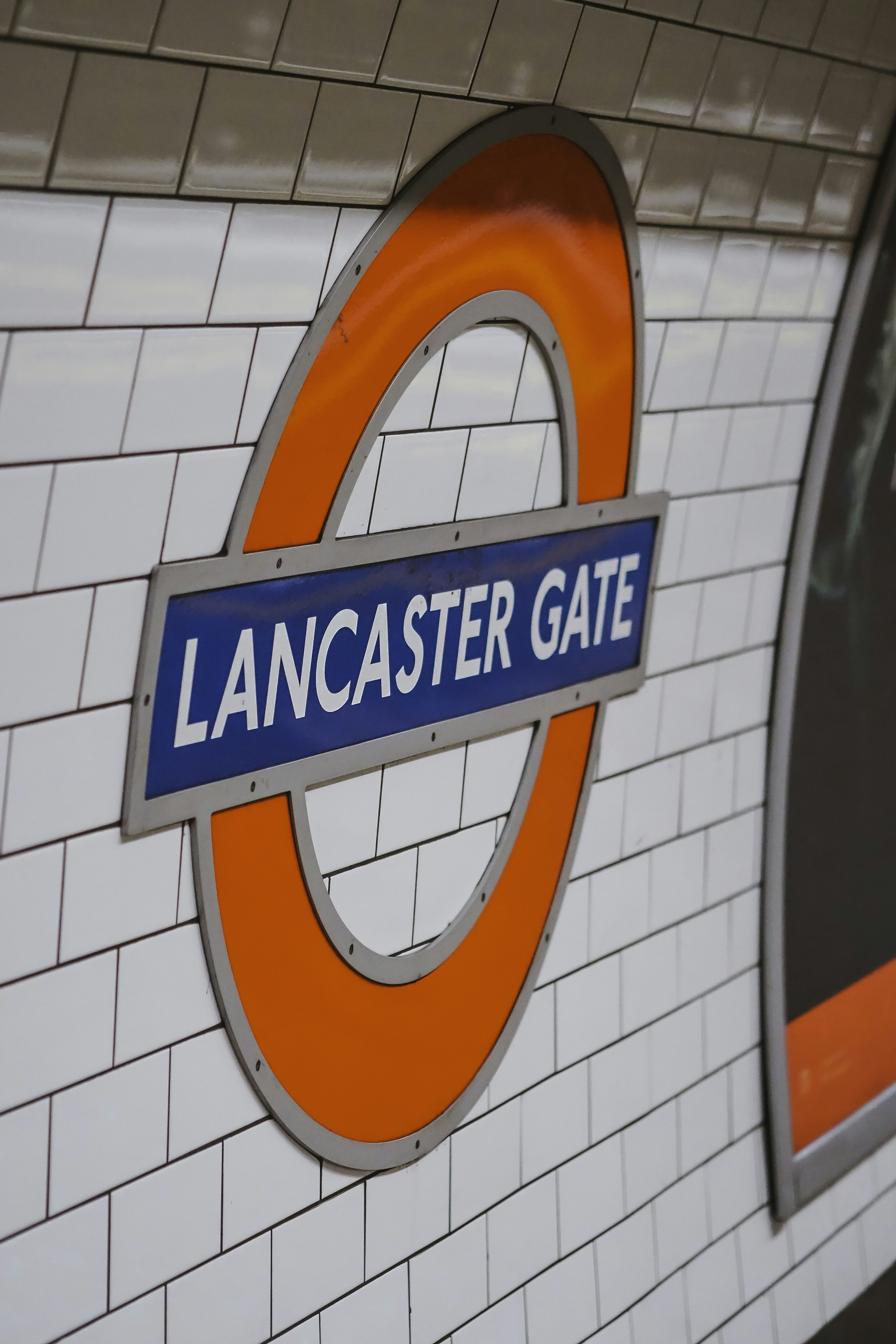 A sign that is on the side of a building photo – Free London Image on ...