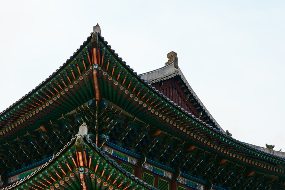 a tall building with a clock on the top of it