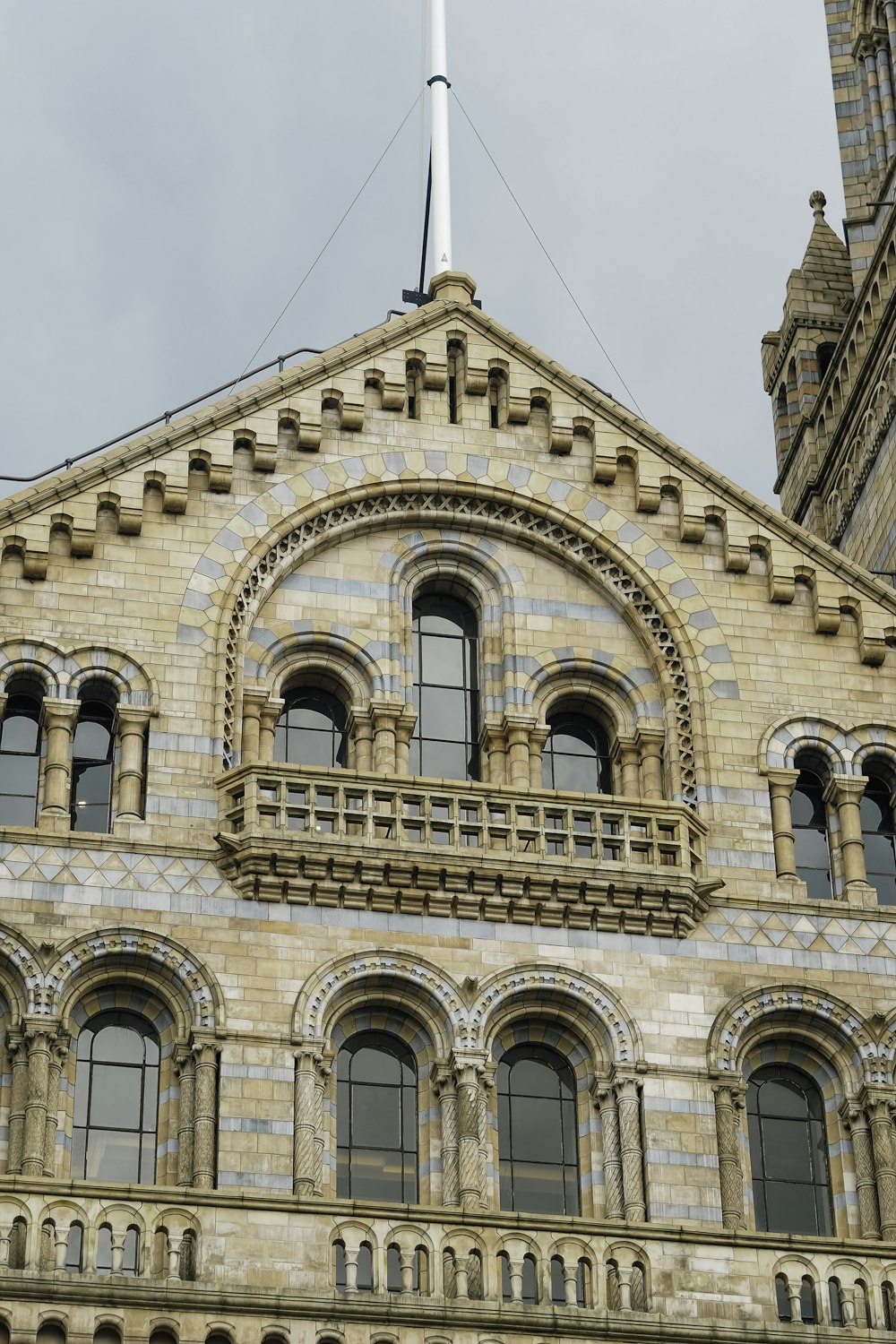 a tall building with a clock on the top of it