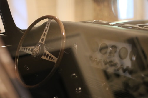 Classic Impala steering wheel with vintage dashboard in soft focus