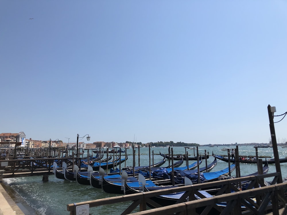 a bunch of boats that are sitting in the water