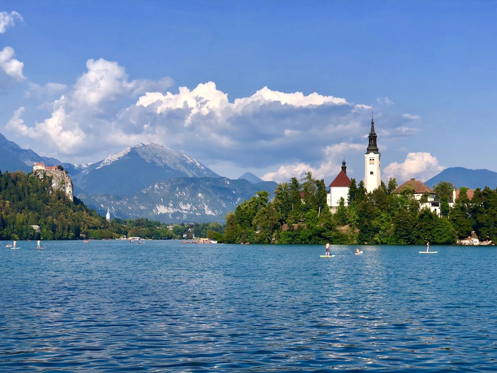 a church on a small island in the middle of a lake