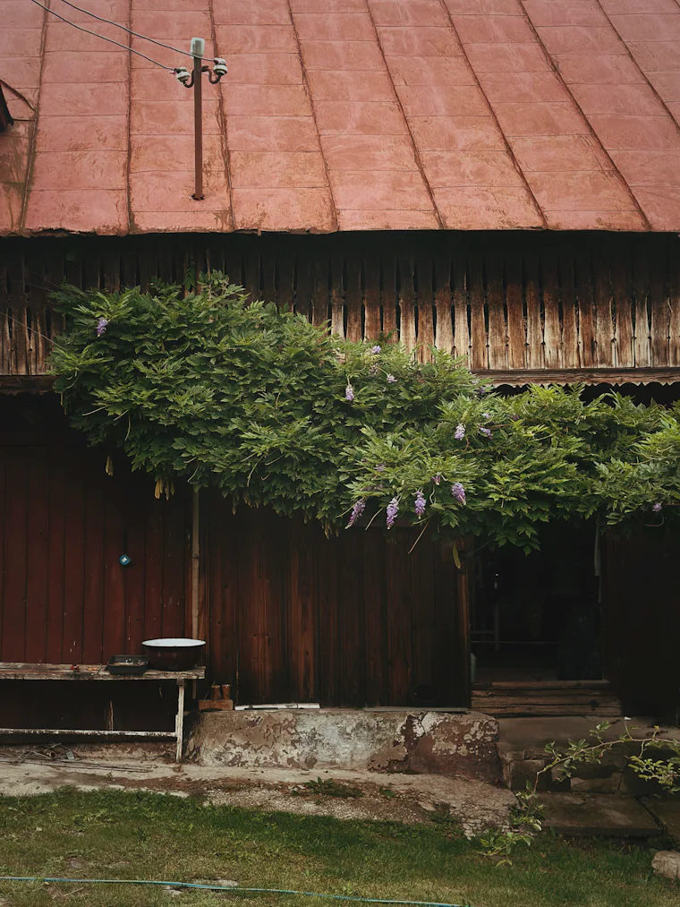 Bench outside a weathered country building