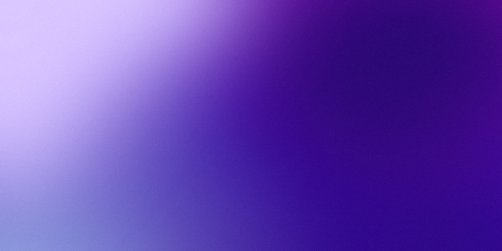 a blurry image of a purple and blue background