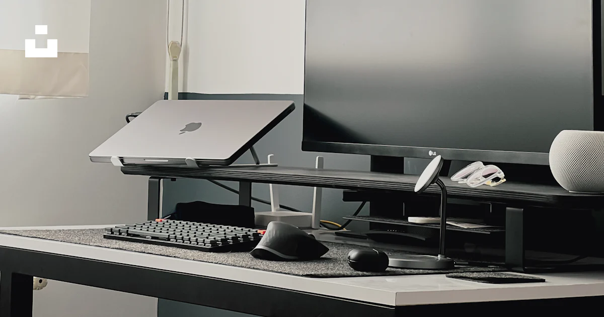 Example Of A Desktop A computer desk with a monitor, keyboard and mouse photo – Free Table ...