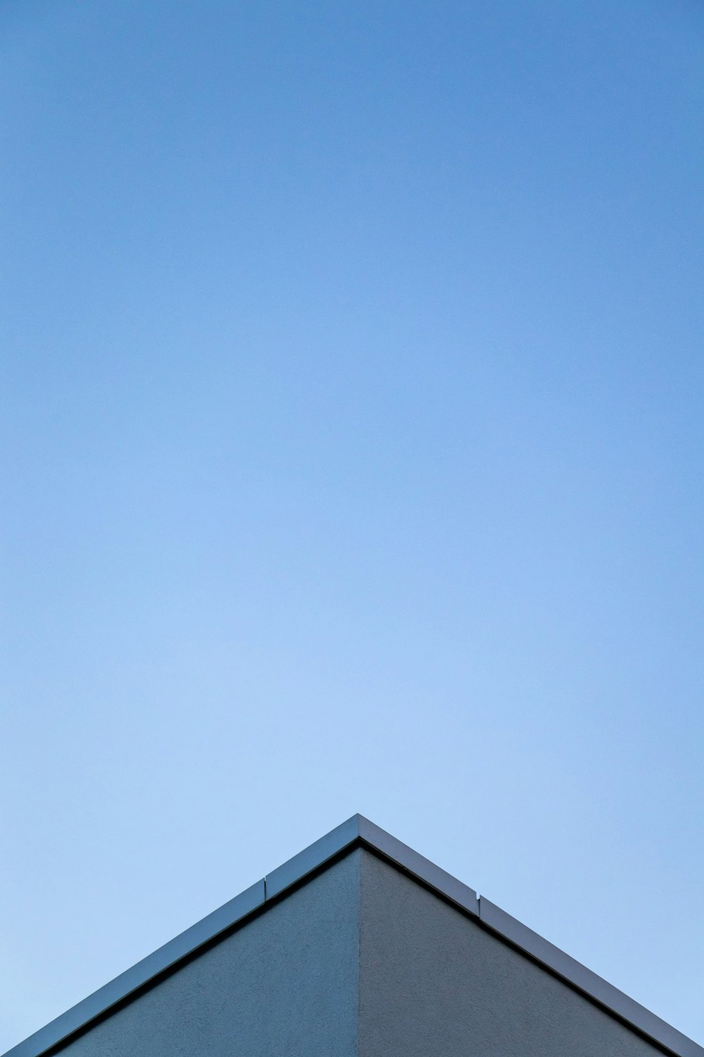 a tall building with a clock on the top of it