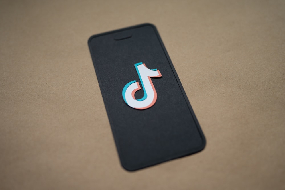 a cell phone with the letter j on it
