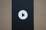An interactive button labeled 'Click here for music' placed under the music image inviting user engagement.