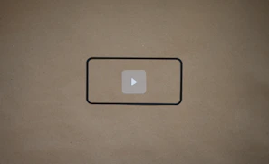 A thumbnail image of a video player paused on a press conference scene