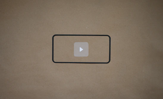 Dark navy SaaS card with cyan accents displaying a two-column layout: left side with status rows and right side with a large rounded video placeholder featuring a play icon.