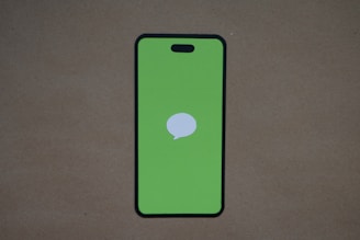 Close-up of comic-style speech balloons on a smartphone display