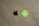 Two logos are positioned on a plain brown background. The black apple logo is on the left side, and the green android robot logo is on the right.