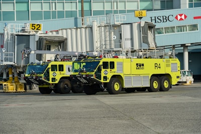 Firefighters in action inspecting airport terminal for fire hazards