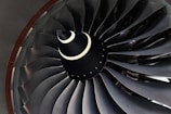 a close up of a jet engine on a table