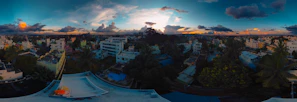 A panoramic view of Sarasota’s skyline at sunset, highlighting the vibrant city life.