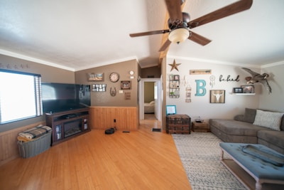A cozy, organized living room with neatly arranged furniture and decor.