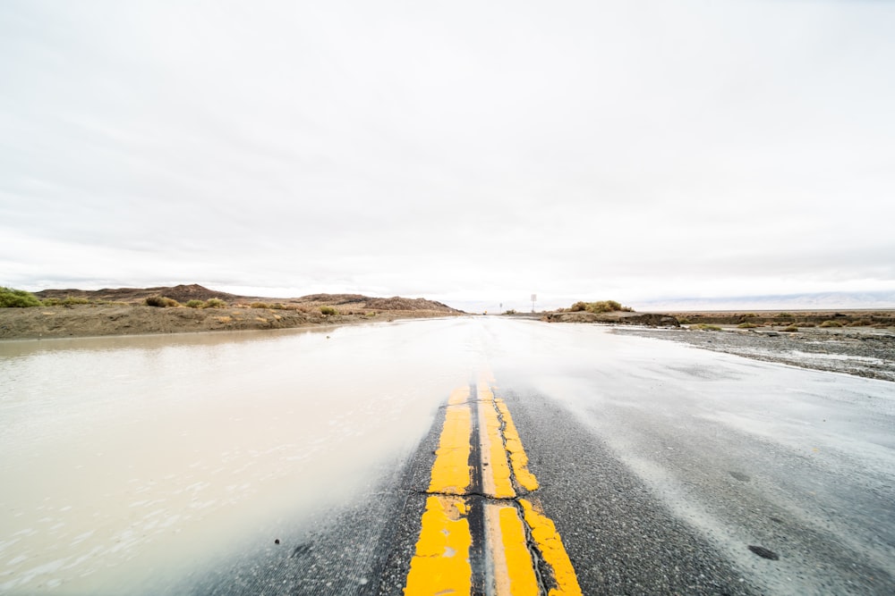 a road with a yellow line in the middle of it