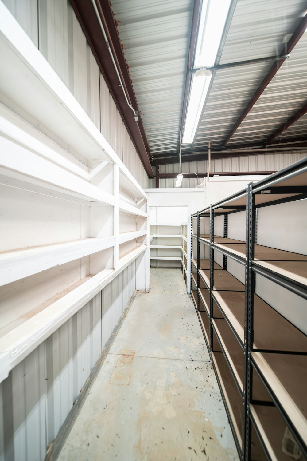 a long row of shelves in a warehouse