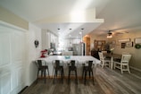 View of the stylish kitchen area with modern appliances and cozy dining space.