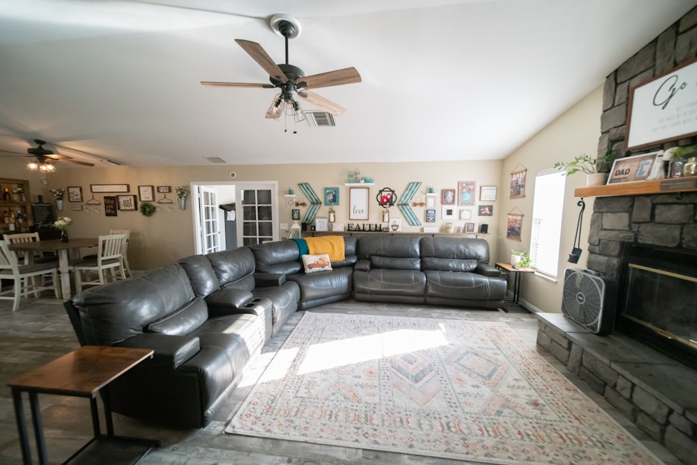 a living room filled with furniture and a fire place