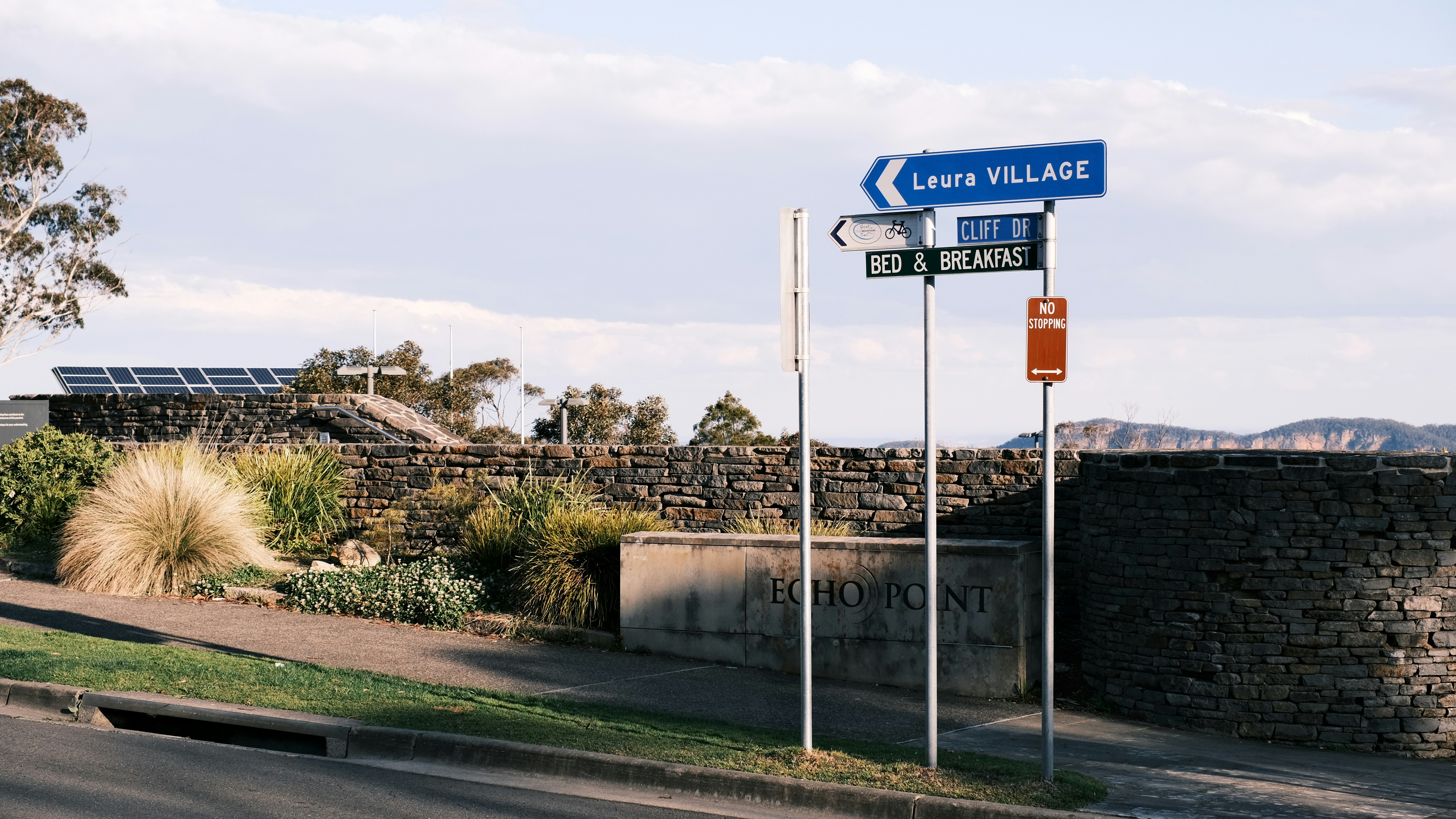 a street sign on the side of a road