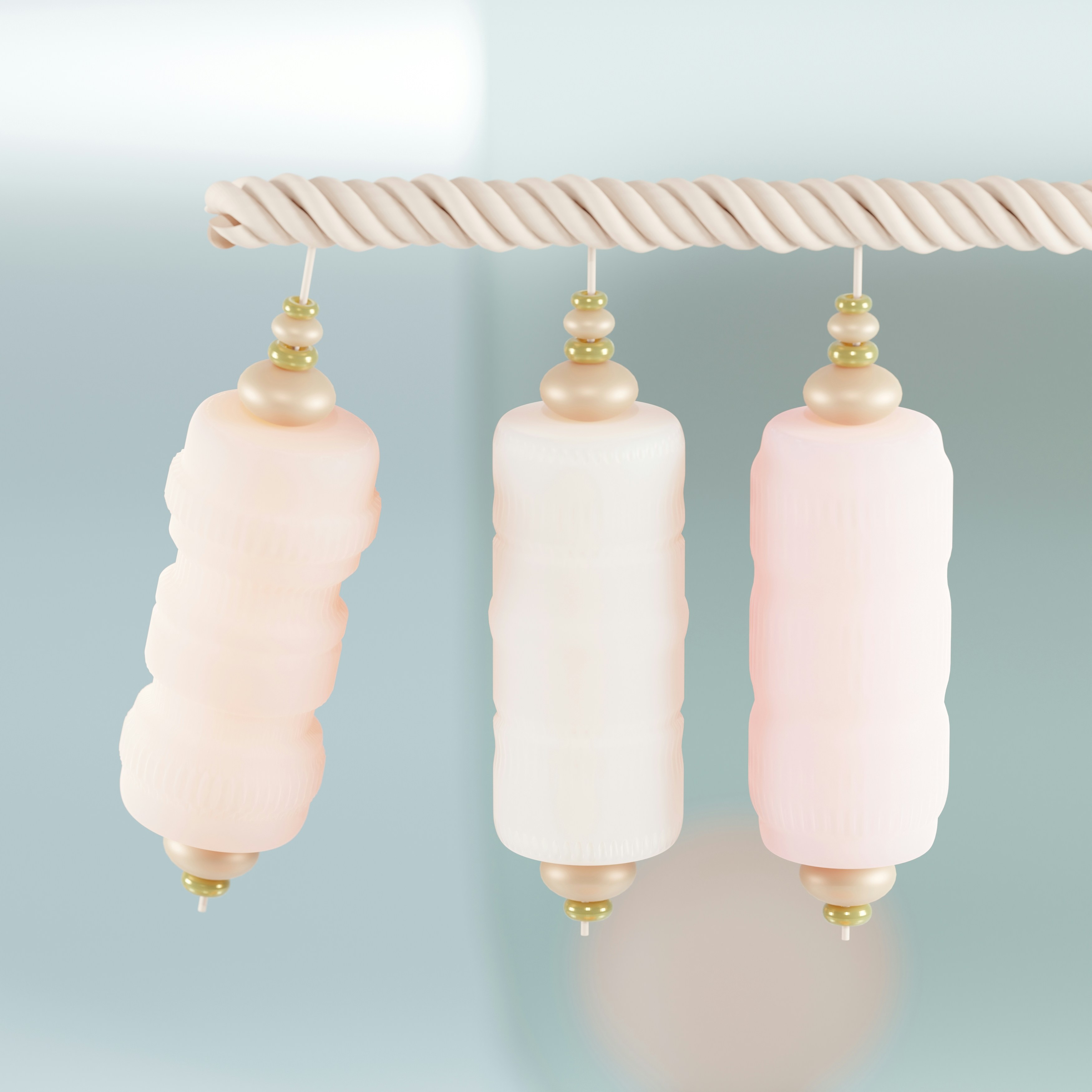 a couple of bottles hanging from a rope