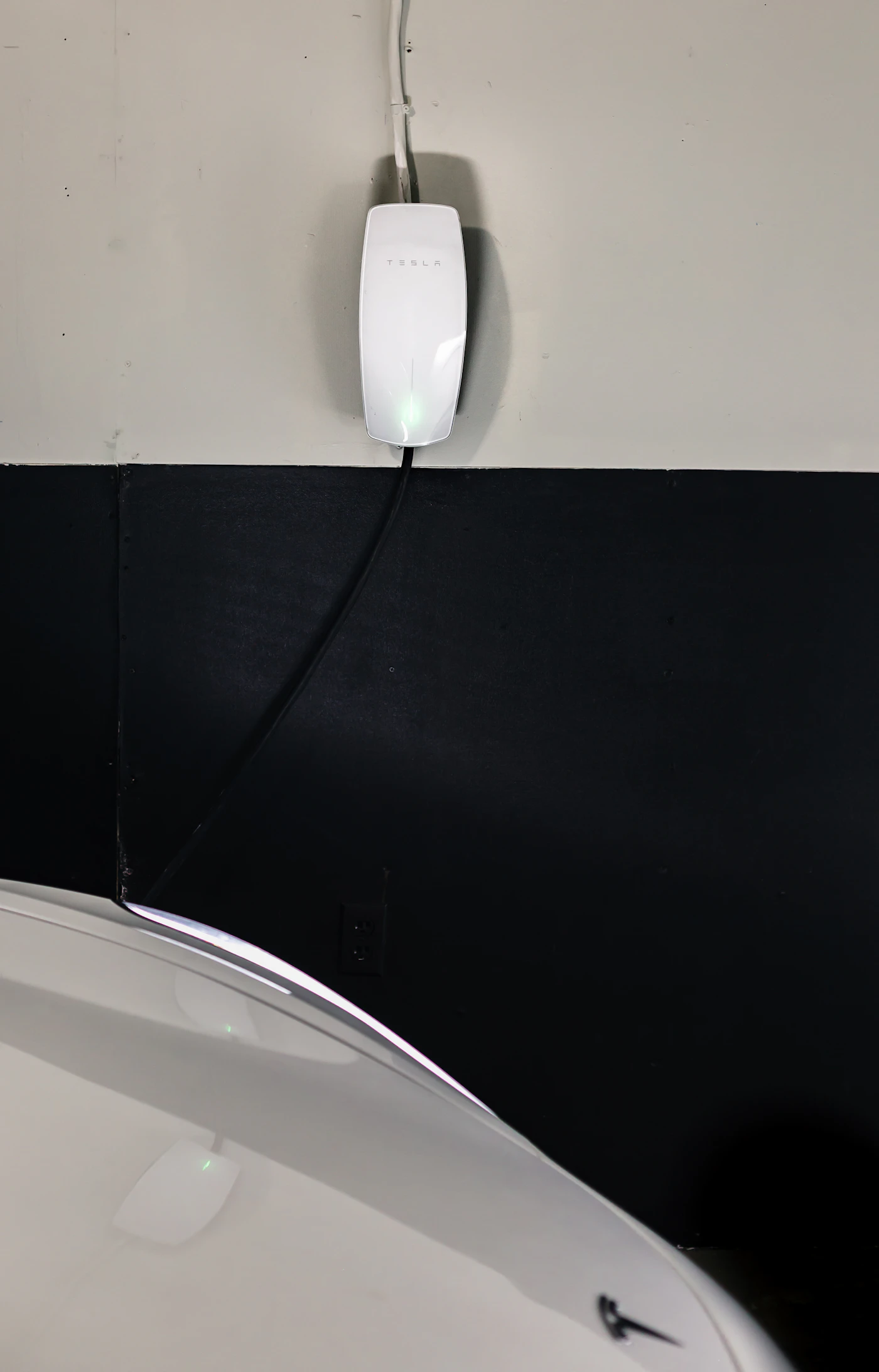 Electric vehicle charging inside a residential garage