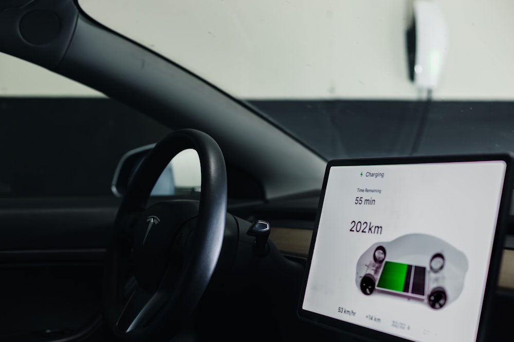 In-car display showing charging status and range