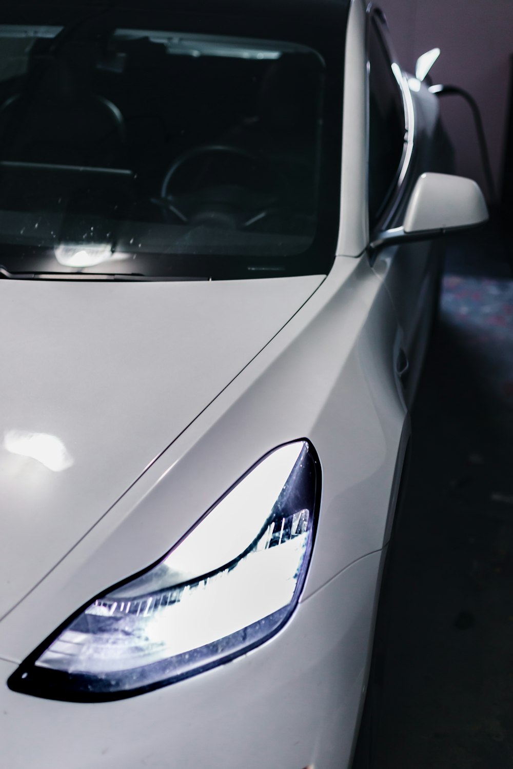 a close up of a white sports car