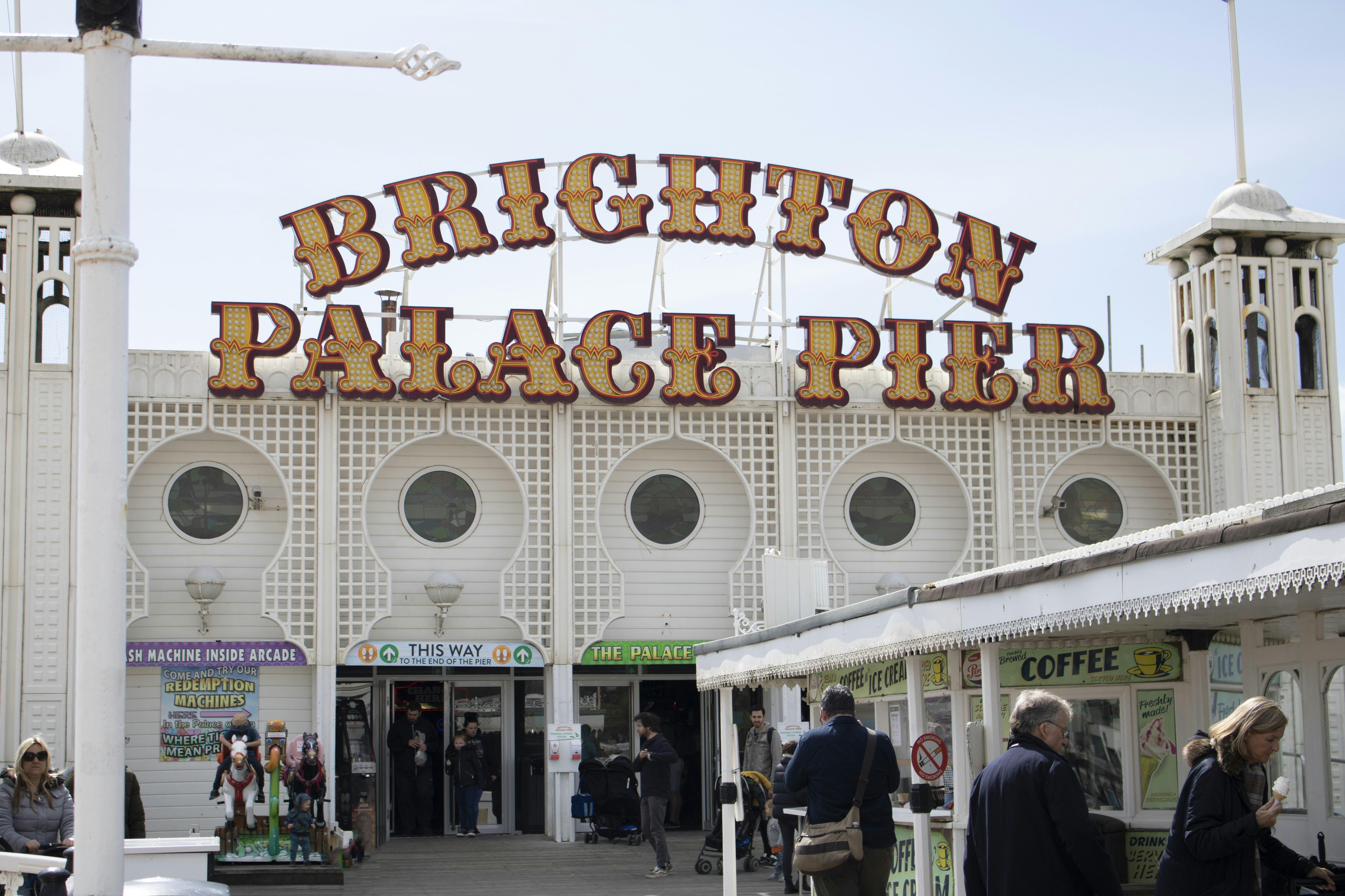 a large sign that says brighton palace pier