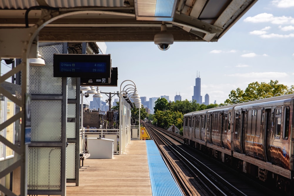 a train on a train track next to a platform