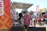 A vibrant food truck serving delicious meals at a sunny outdoor market.