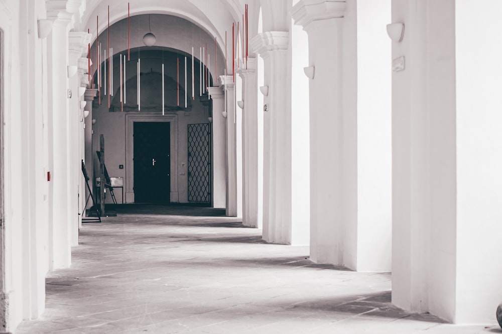 a black and white photo of a hallway