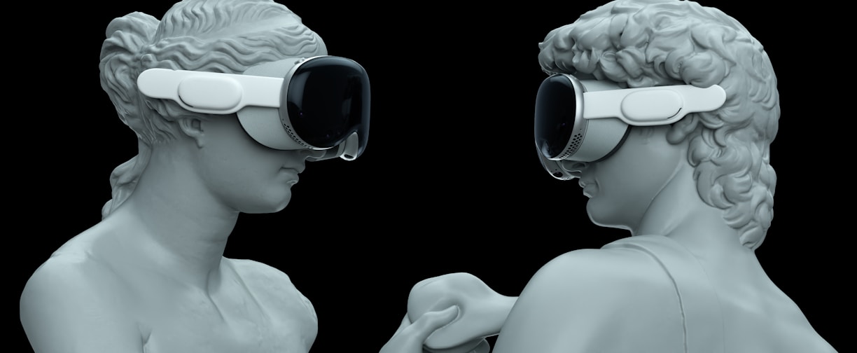 a couple of statues wearing virtual glasses