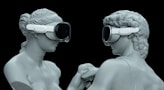 a couple of statues wearing virtual glasses