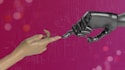 two hands touching each other in front of a pink background