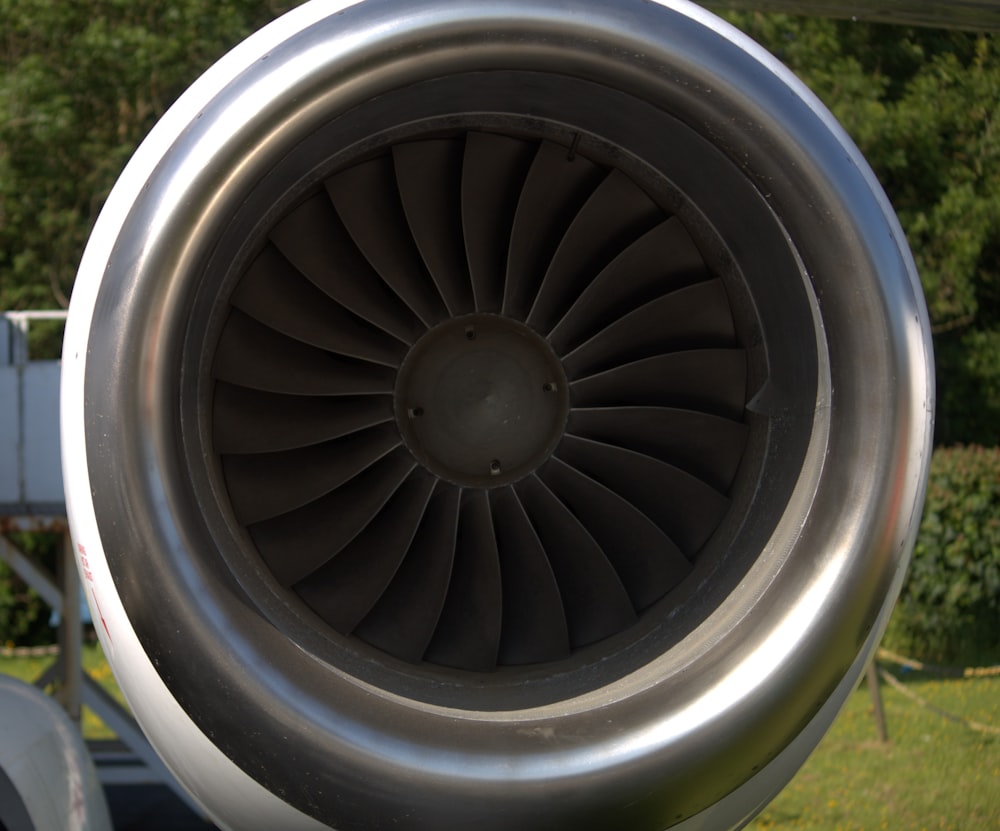 a close up of a jet engine on a plane