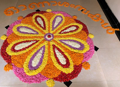 Close-up of an intricate floral marble inlay floor design with rich colors.