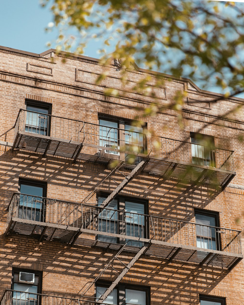 a fire escape on the side of a brick building