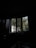 A beautifully lit interior with bifolding windows opening to a garden view.