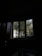 A beautifully lit interior with bifolding windows opening to a garden view.