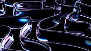 Colorful water tubes bubbling with vibrant liquids under soft lighting.