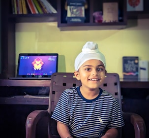 A warm, inviting image of a child learning the Noorani Qaida with a patient tutor online.