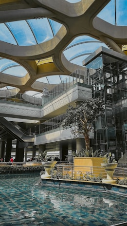 a large building with a pool inside of it